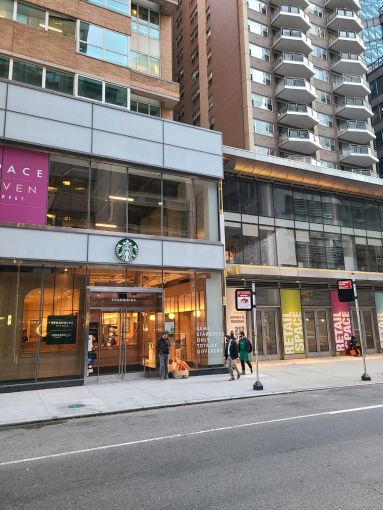 Exterior of the new Starbucks and Amazon combo store at 111 East 59th Street.