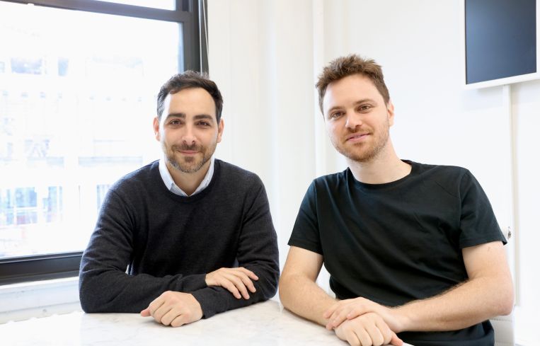 Two men at a table.