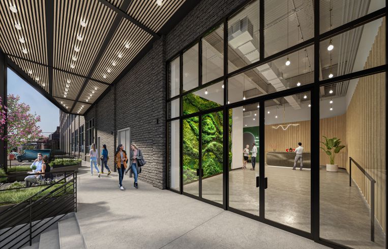 The entrance is getting a new canopy and an updated lobby with a green wall, new reception desk and new finishes.
