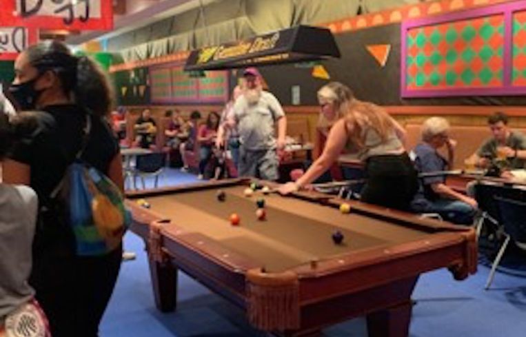 Playing pool at Moe's.