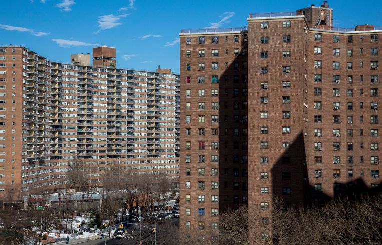 Tall, blocky, brick buildings.