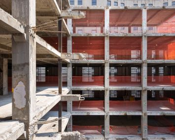 Demolition is largely complete at One Madison Avenue, where SL Green is carving a hole in the middle of an existing late 19th century building to construct a glassy new tower designed by KPF.
