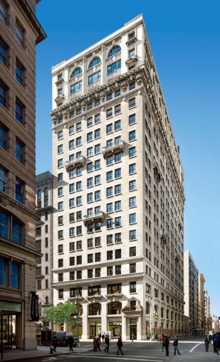 The tall, think white building at 114 Fifth Avenue.
