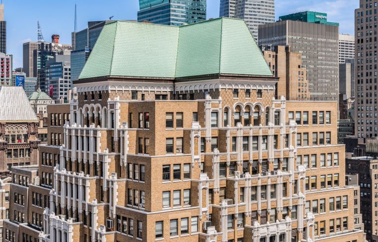 The tiered, tan rooftop of 520 8th Avenue.