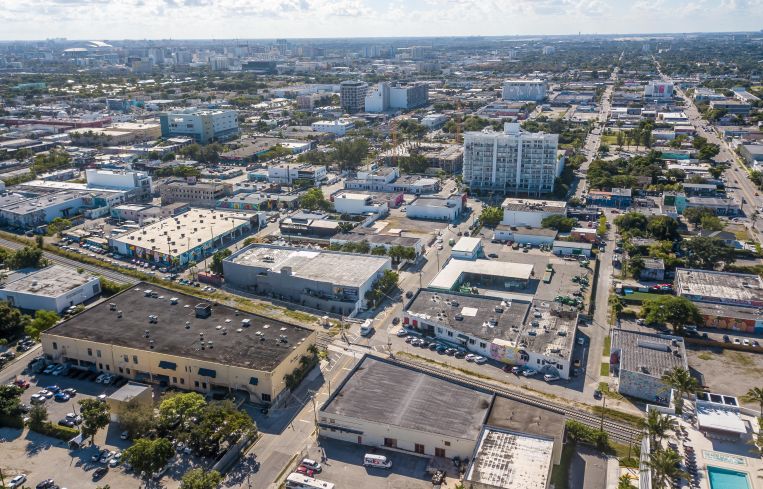The short building at 45 NE 27 Street, pictured from an air view.