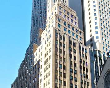 The tall white skyscraper at 444 Madison Avenue.