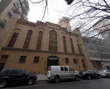 The orange short building at 47 West 66th Street.