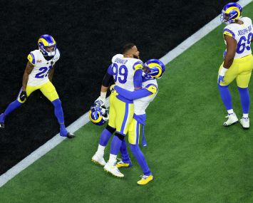 Aaron Donald #99 of the Los Angeles Rams reacts after a sack on Joe Burrow #9 of the Cincinnati Bengals during Super Bowl LVI at SoFi Stadium on February 13, 2022 in Inglewood, Calif.