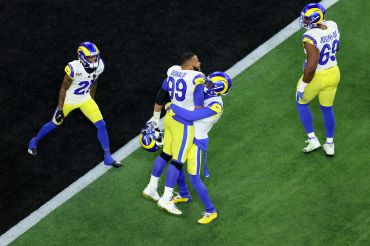 Aaron Donald #99 of the Los Angeles Rams reacts after a sack on Joe Burrow #9 of the Cincinnati Bengals during Super Bowl LVI at SoFi Stadium on February 13, 2022 in Inglewood, Calif. 