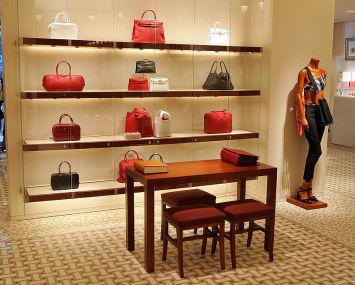 A interior view at the opening of the Hermes store on Wall street on June 21, 2007 in New York City. A wall is decorated with red bags.