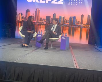 Lopa P. Kolluri, principal deputy assistant secretary for the Office of Housing and FHA HUD, addresses attendees at MBA's CREF 2022 at the Grand Hyatt in San Diego in a discussion moderated by Matthew Rocco Jr., MBA chair-elect and CEO of Grandbridge Real Estate Capital.