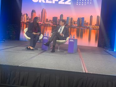 Lopa P. Kolluri, principal deputy assistant secretary for the Office of Housing and FHA HUD, addresses attendees at MBA's CREF 2022 at the Grand Hyatt in San Diego in a discussion moderated by Matthew Rocco Jr.,  MBA chair-elect and CEO of Grandbridge Real Estate Capital. 