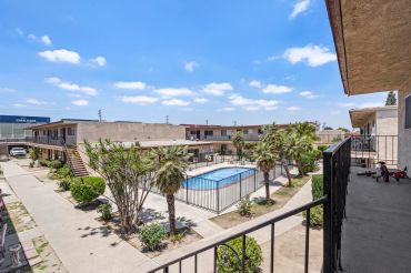 The properties are located across the street from one another, near access to Interstate 405 and the Long Beach Freeway.
