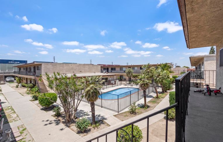 The properties are located across the street from one another, near access to Interstate 405 and the Long Beach Freeway.