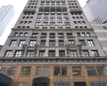 The large tan building at 15 Park Row.