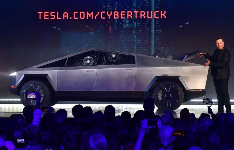 Tesla co-founder and CEO Elon Musk gestures while wrapping up his presentation of the all-electric battery-powered Tesla Cybertruck at Tesla Design Center in Hawthorne, California in 2019.