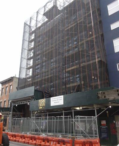The building under scaffolding at 106 North Third Street.