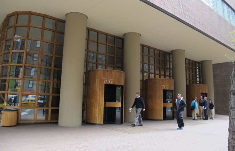 The wooden door corrals are being replaced with glass revolving doors.