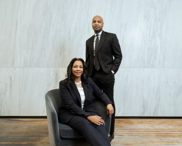 Pamela West (seated, left) and Nadir Settles (standing, right).