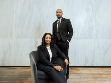 Pamela West (seated, left) and Nadir Settles (standing, right).