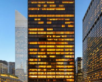 The large black and yellow-lit Seagram building.