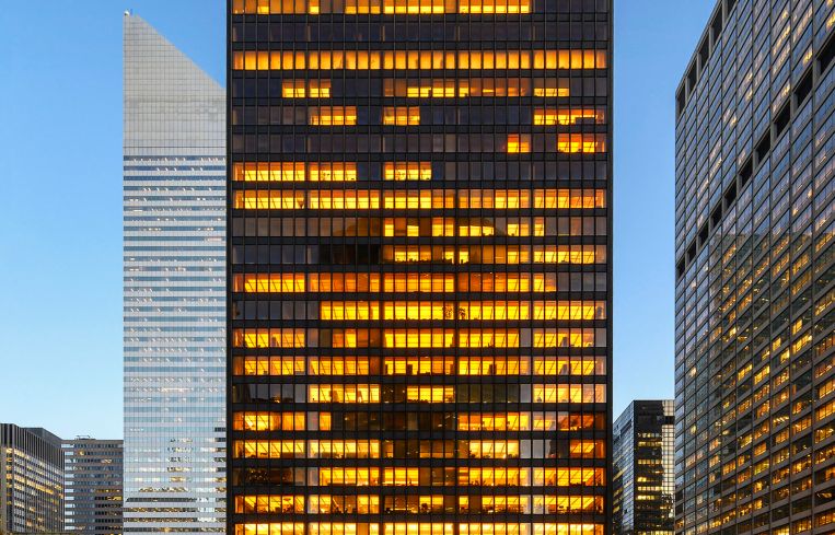 The large black and yellow-lit Seagram building.