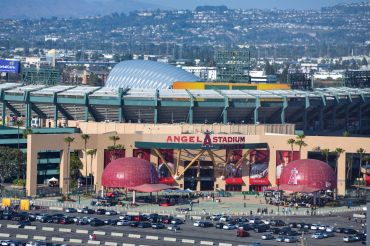 Angel Stadium in Anaheim, above, on May 16, 2022. Anaheim Mayor Harry Sidhu is under federal investigation in connection with the city's sale of Angel Stadium. An affidavit filed in federal court May 12 says authorities are investigating whether Sidhu shared privileged and confidential information with the Angels during stadium sale negotiations, and expected to receive campaign contributions as a result.