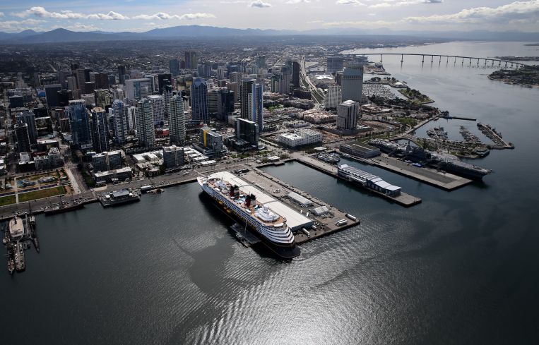Aerial view of the Disney Wonder cruise ship docked at B Street Pier in San Diego.