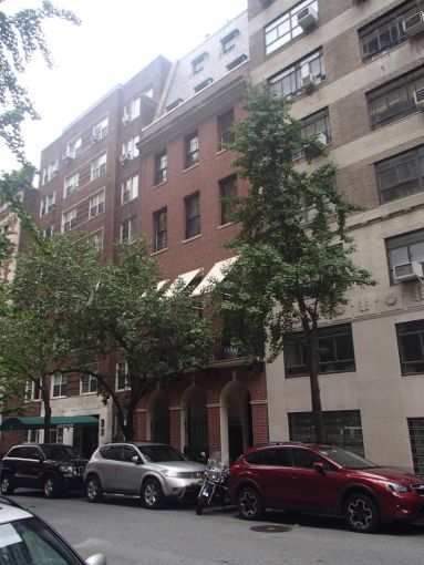 The small brown townhouse at 15 East 88th Street.