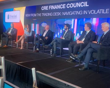 Panelists at the "A View From the Trading Desk: Navigating in Volatile Times" panel held at CREFC's annual June New York City conference.