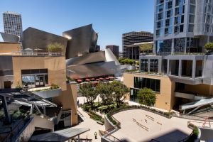 The Grand LA, designed by Frank Gehry is located across from the Walt Disney Concert Hall - also designed by Gehry.