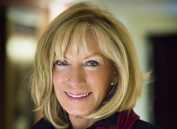portrait of Marilee Utter, global chair of The Counselors of Real Estate