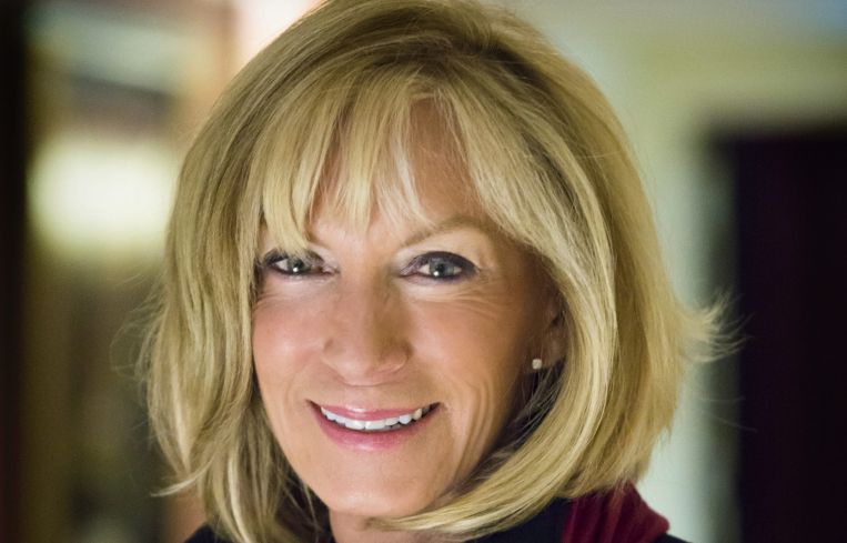 portrait of Marilee Utter, global chair of The Counselors of Real Estate
