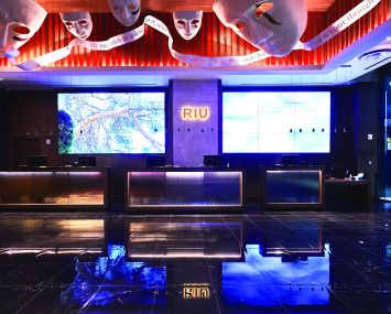 New York hotels such as the Hotel Riu Plaza Manhattan Times Square are benefitting from a tourism increase, but are still awaiting a fuller return of business travel.