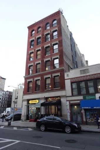 The brick building at 154 Grand Street in SoHo, which was home to the first WeWork in New York City.