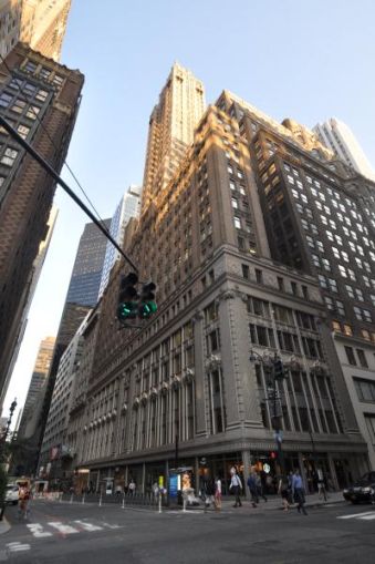 The tall, L-shaped building at 295 Madison Avenue.
