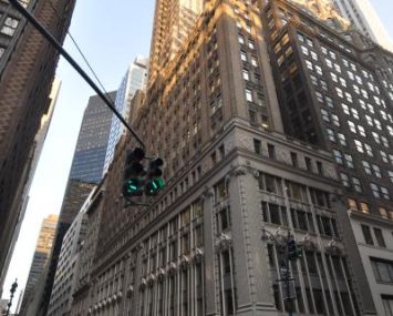 The tall, L-shaped building at 295 Madison Avenue.