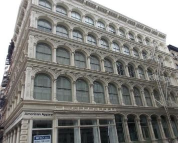The five-story white SoHo building at 427 Broadway.