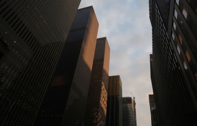 The sun rises on office towers in Rockefeller Center on 6th Avenue on July 25, 2019 in New York City.