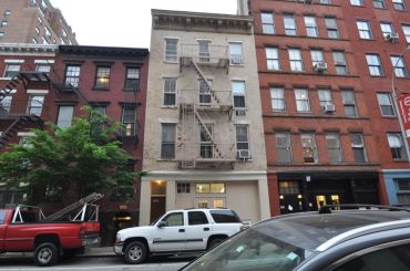 The short residential building at 803 Greenwich Street.