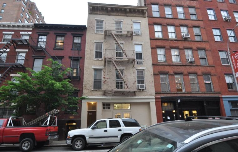 The short residential building at 803 Greenwich Street.