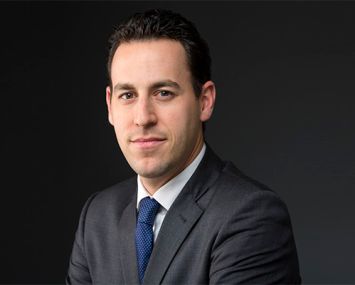 A headshot of Andrew Wiener.