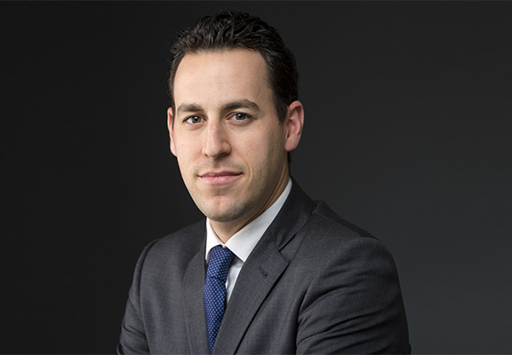 A headshot of Andrew Wiener.