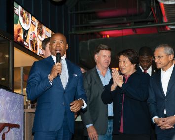 Mayor Eric Adams, Urban Space's Eldon Scott, food writer K.F. Seetoh and Burhan Gafoor, Singapore's UN ambassador, at the grand opening Sept. 27 of the Urban Hawker food hall.
