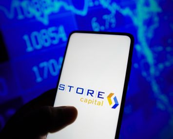 The STORE Capital logo seen displayed on a smartphone screen.