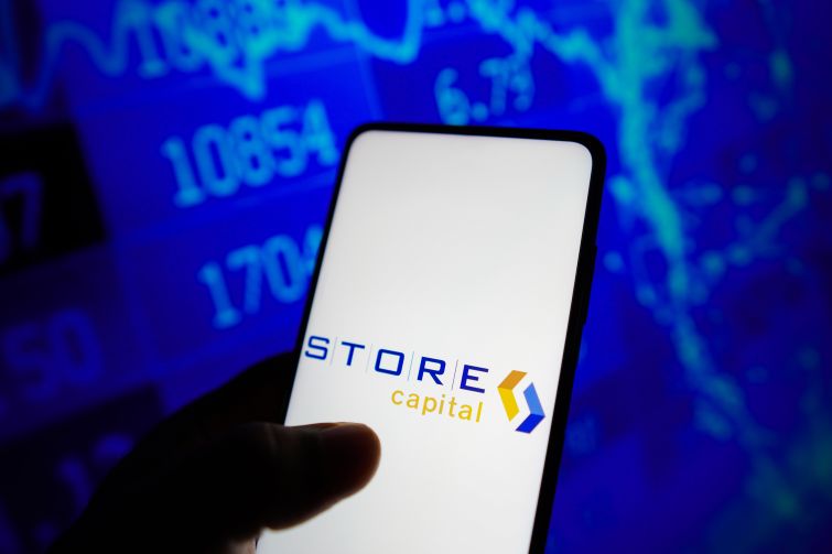 The STORE Capital logo seen displayed on a smartphone screen.