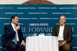 Moderator Javier Avino interviews Miami Beach Mayor Dan Gelber