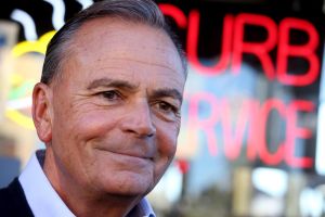 Rick Caruso answers question for media while making a post election stop at Langer's Deli in MacArthur Park.