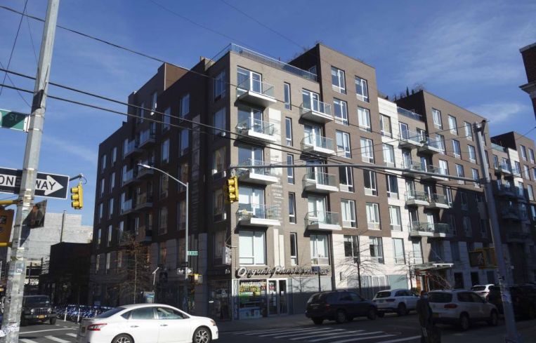 The short residential building at 205 North Ninth Street.