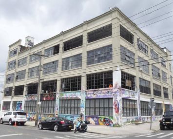 The large, four-story loft-style office building at 49 Wyckoff Avenue in Bushwick, Brooklyn.